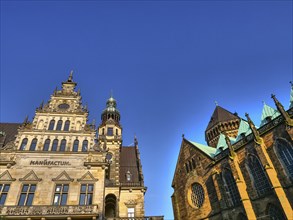 Historic buildings and towers under a bright blue sky, Bremen, Germany, Europe