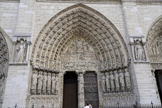 Detail of the main portal of Notre Dame Cathedral, Paris, FranceParis, France, Europe, Facade of a