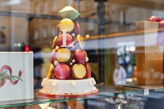 Macarons in the shop window of the pastry shop Laduree, Saint-Germain-des-Pres, Paris, Ile de