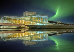 Opera illuminated night northern lights reflection Oslo Norway