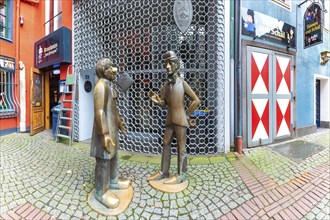 Monument to Tünnes and Schäl, two legendary characters from the Hänneschen puppet theatre in