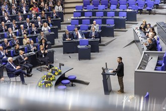 Volodymyr Zelensky (President of Ukraine) gives a speech at a special session of the German