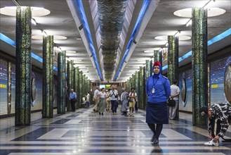 Conductor in uniform at Kosmonavtlar Metro station in Tahskent, Uzbekistan, Asia