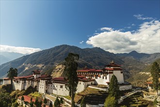 View of the Trongsa Dzong on a sunny day with blue sky