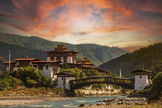 Punakha Dzong at sunset with the Mo Chhu river in Bhutan