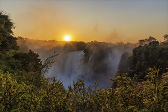 Sunset at Victoria Falls with high waters in June