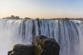 Close-up of the mighty Victoria Falls waterfall in Matabeleland on a late afternoon