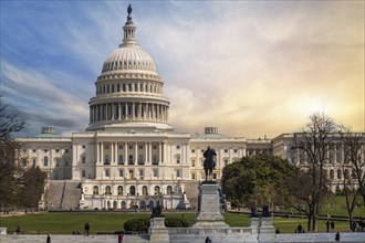 The United States Capitol building at sunset