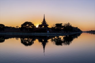 Pagoda silhouette during a sunset in Mandalay, Myanmar (Burma)