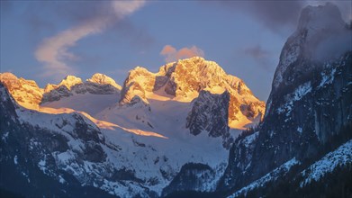 Sunset reflecting on the mountain Dachstein