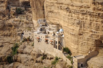 St. George Orthodox Monastery is located in Wadi Qelt. The sixth-century cliff-hanging complex,