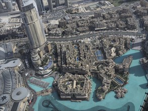 View of a modern cityscape with impressive buildings and large expanses of water, Dubai, Arab