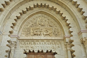 Tympanum of the portal of the Priory of Notre-Dame church built 12th century, detail, priory,