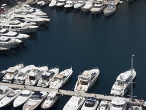 Harbour with numerous yachts parked in the water, maritime ambience, monte carlo, monaco, france