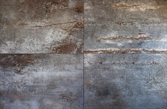 Large porcelain stoneware tiles for coverings. Stone and rust color background