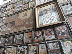 Votive pictures, votive tablets on the walls of the chapel of grace inside the church, pilgrimage