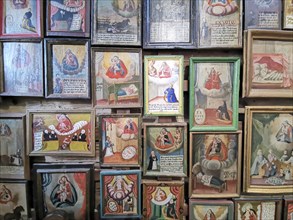 Votive pictures, votive tablets on the walls of the chapel of grace inside the church, pilgrimage