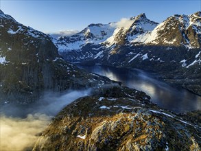 Aerial view, steep mountains, coast, winter, fog, evening light, A i Lofoten, Moskenesoya, Lofoten,