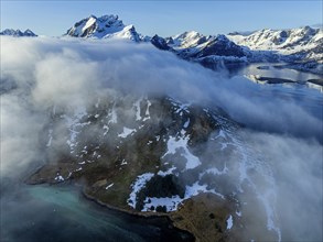 Aerial view, steep mountains, coast, winter, fog, morning light, Moskenesoya, Lofoten, Norway,