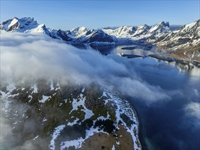 Aerial view, steep mountains, coast, winter, fog, morning light, Moskenesoya, Lofoten, Norway,