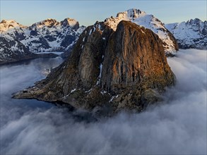 Aerial view, steep mountains, coast, winter, fog, morning light, Reine, Moskenesoya, Lofoten,