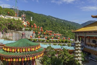 Chinese temple with lanterns and views of green hills and mountains, Pattaya, Thailand, Asia