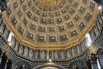 The dome of the cathedral with a starry sky and black and white striped marble columns and round