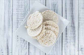 Old wooden table with Rice Cakes (detailed close-up shot)