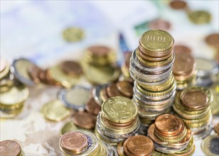 Stacked Euro Coins (on Banknotes) as detailed close-up shot