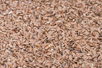 Detailed close-up shot of brown Linseeds for use as background or texture