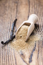 Portion of homemade Brown Vanilla Sugar (close-up shot)