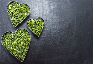 Heart shapes filled with fresh cutted Chive (I love herbs concept)