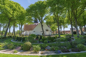 Bogense on the Kattegat, St Nicolas Church, Danish architecture, group of trees, graves,