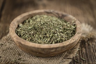 Dried Stevia leaves (selective focus) on vintage background