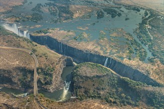 Victoria Falls at drought near Livingstone, Zimbabwe, as aerial shot made from a helicopter, Africa