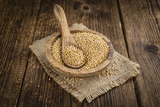 Mustard Seeds on a vintage background as detailed close-up shot (selective focus)