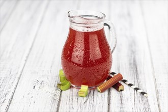 Homemade Rhubarb Spritzer as detailed close up shot (selective focus)