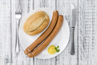 Wiener Sausages on a vintage background as detailed close-up shot (selective focus)