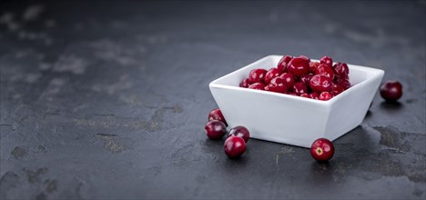 Portion of Preserved Cranberries as detailed close-up shot, selective focus