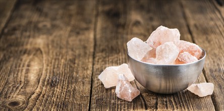 Portion of pink himalayan Salt (detailed close-up shot, selective focus)
