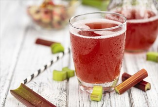 Homemade Rhubarb Spritzer as detailed close up shot (selective focus)