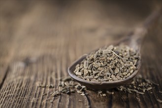 Heap of valerian roots (close-up shot) on vintage wooden background