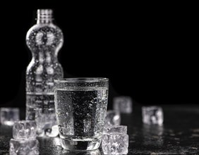 Some chilled sparkling water (detailed close up shot, selective focus)