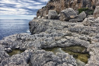 Rocks and cliffs at Cala Llombards on Majorca Spain