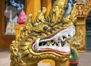 Close-up of gilded Naga, guardian deity, Wat Mixai, Vientiane, Laos, Asia