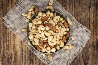 Portion of roasted nuts as detailed close up shot (selective focus)