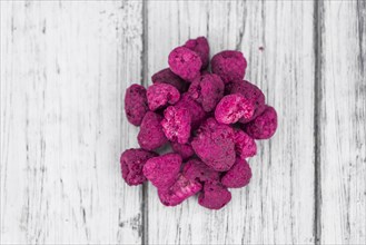 Dried Raspberries on a vintage background as detailed close-up shot, selective focus