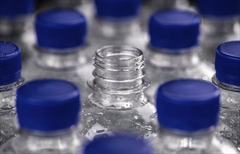 Bottles of chilled sparkling water as detailed close up shot