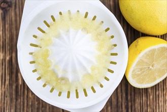 Fresh made Juice (lemon) on a vintage background (close-up shot)