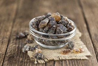 Portion of brown Rock Candy as detailed close-up shot (selective focus)